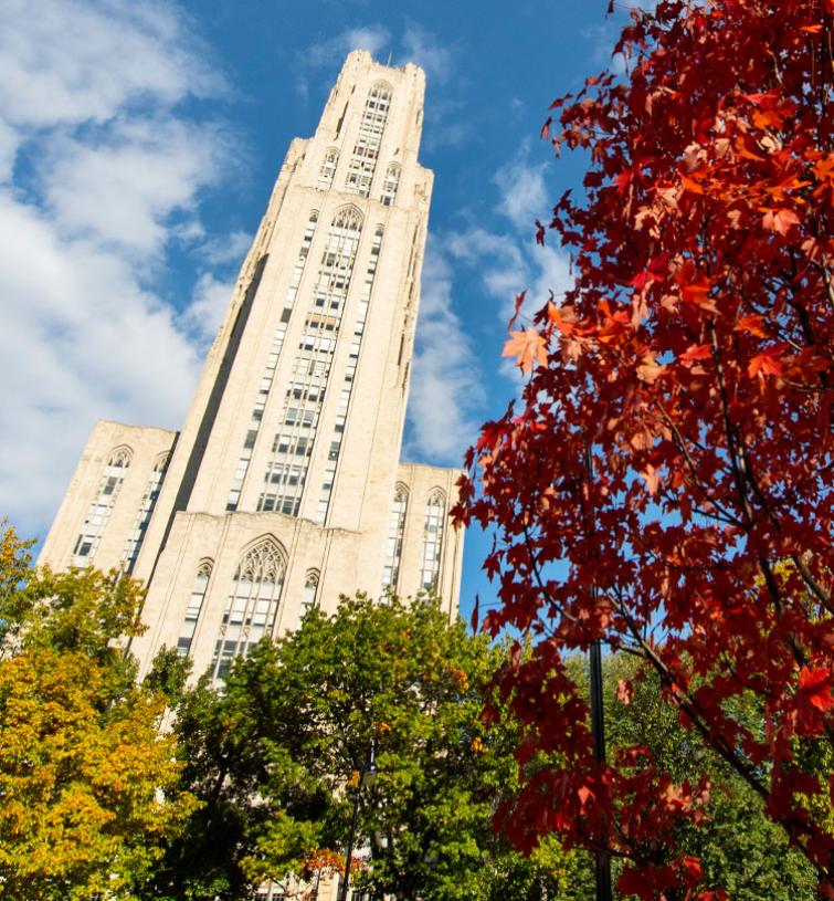 Cathedral of Learning with fall foliage in the foreground