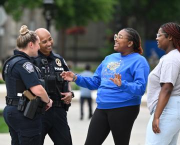 students talking to police